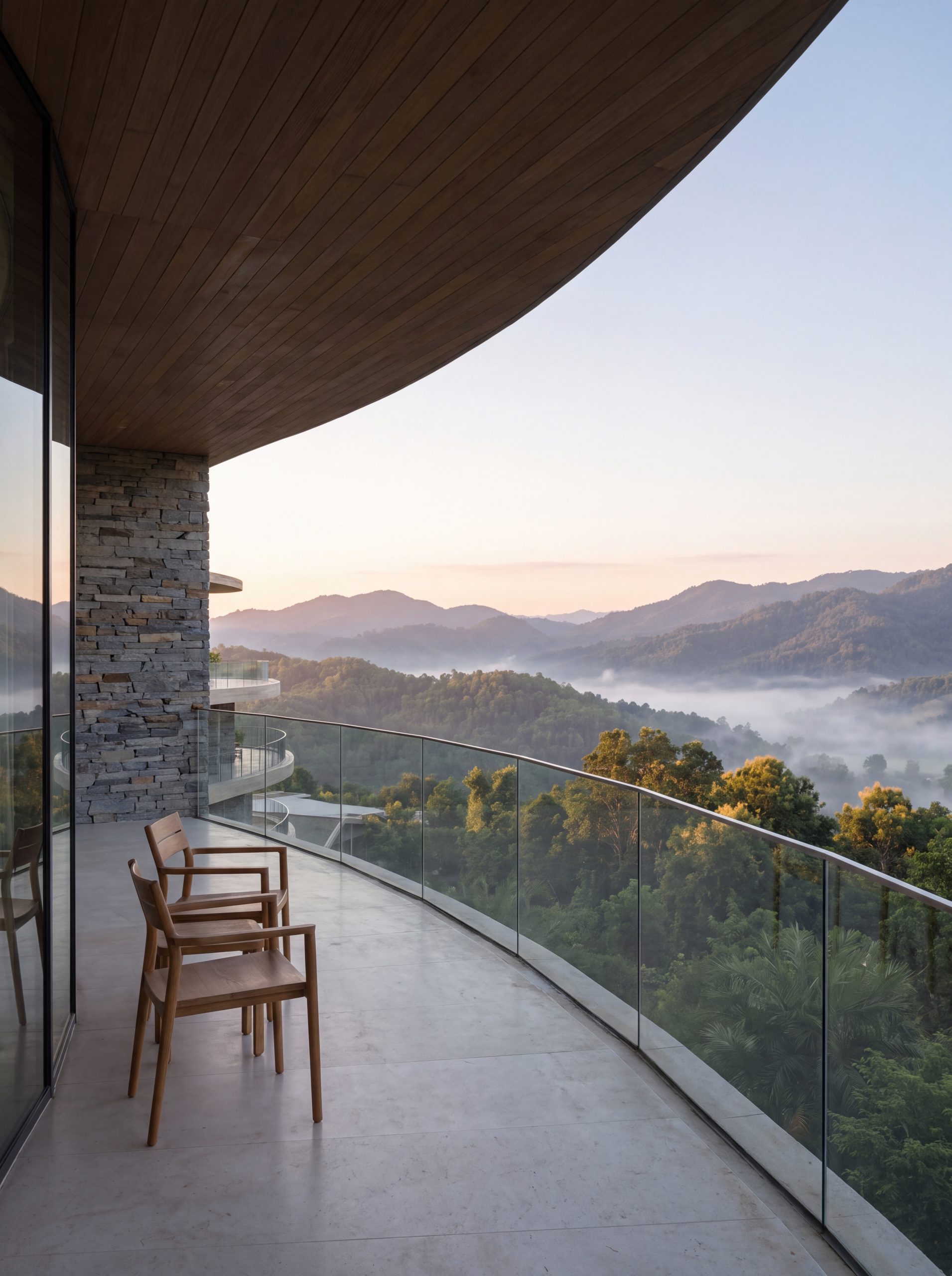 Morning light on a suite terrace above the cloud line